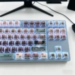 Dynamic shot of Kaiju No. 8 faceted side-lit PBT keycaps set, emphasizing their dark, angular design and translucent facets for a premium, artistic aesthetics.