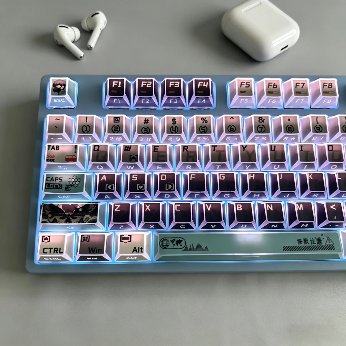 Exclusive Kaiju No. 8 faceted side-lit PBT keycaps set displayed from various angles, highlighting their dark, angular design and translucent facets.