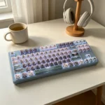 Dynamic views of the Kaiju No. 8 faceted side-lit PBT keycap set, showcasing its dark, angular design and unique translucent facets.