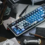 Artistic Kaito Kid Phantom Thief PBT keycaps set showcasing exclusive anime motifs in elegant design, presented from multiple angles.
