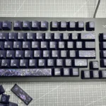 A gallery of Yog-Sothoth keycaps set, showcasing the Yog-Sothoth cosmic horror theme. Intricate eldritch symbols and dark mystical designs are visible from few angles.