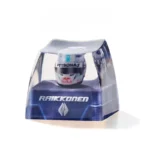 Premium Kimi Raikkonen 2001 F1 helmet keycap, showcasing its intricate side profile and iconic racing livery details as a collectible miniature.
