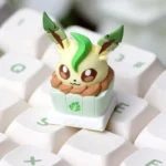 Detailed top-down shot of the artistic Leafeon cake artisan ESC keycap, highlighting its unique whimsical design and intricate Pokemon character design.