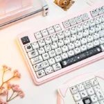 Playful line art cat PBT MAO profile keycaps set from a different angle, showcasing whimsical minimalist designs. Durable PBT material and charming aesthetics.