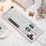 Playful Line Art Cat PBT MAO Profile Keycaps Set. Whimsical minimalist feline designs on durable PBT, offering a charming keyboard aesthetic.