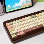 Whimsical Little Bear Forest PBT dye-sub keycaps set, showcasing durable artistry with adorable bear motifs and earthy tones, captured from a detailed.