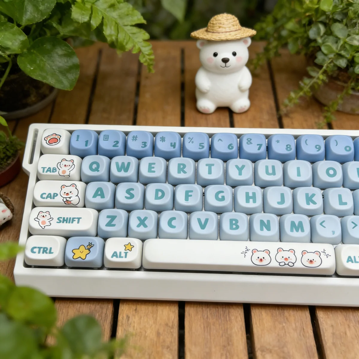 Playful Little Bear PBT MOA ergonomic keycaps set display adorable white bear art on minimalist keycaps, captured from a distinct angle.