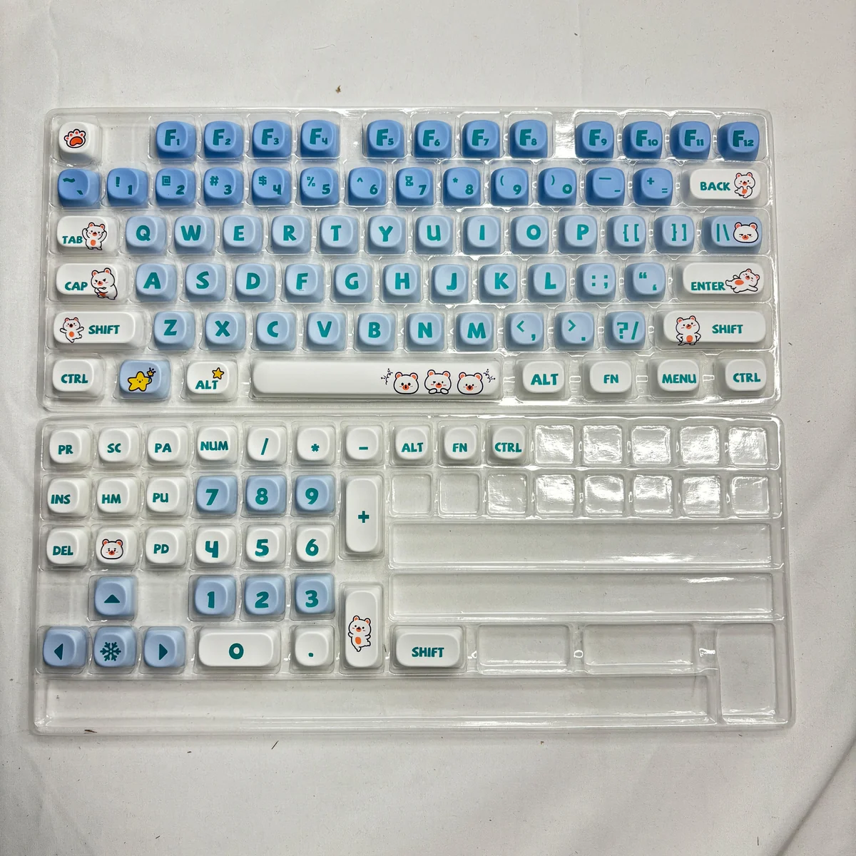 Adorable Playful Little Bear PBT MOA ergonomic keycap set, featuring white bear illustrations on clean keys, viewed from multiple angles.