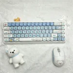 Playful Little Bear PBT MOA ergonomic keycap set, showcasing adorable white bear illustrations on minimalist keys.