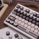 Sweet Elegance Lolita Cocoa PBT keycaps set from various angles, showcasing the exclusive romantic design, warm cocoa tones, and delicate vintage artistry design.
