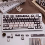 Sweet Elegance Lolita Cocoa PBT keycap set, an exclusive designer collection with romantic vintage artistry, warm cocoa tones, and delicate patterns.