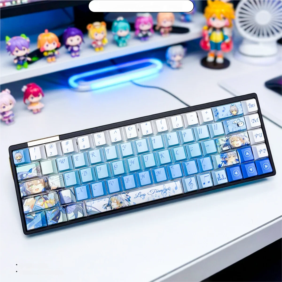 Vibrant Luo Tianyi side-lit keycap set gallery, showcasing exclusive Vocaloid character art with its translucent design illuminated on a mechanical keyboard.