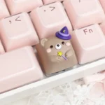Handcrafted Magic Bear artisan ESC keycap from a unique angle, highlighting its whimsical forest creature design and enchanting details for playful setup.