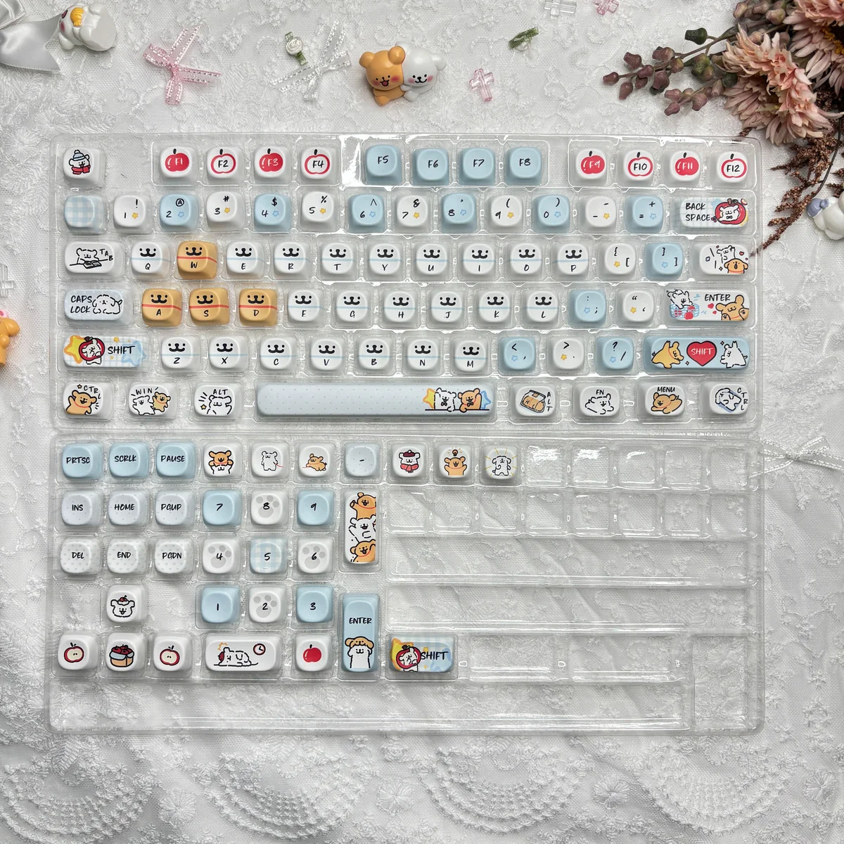 Adorable Maltese PBT MOA keycap set, showcasing charming dog and apple illustrations from a unique angle for a playful keyboard.