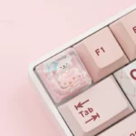 Close-up of the whimsical handcrafted resin Maltese dog ESC keycap, highlighting the charming line-art Maltese in a playful outfit, clear resin finished.