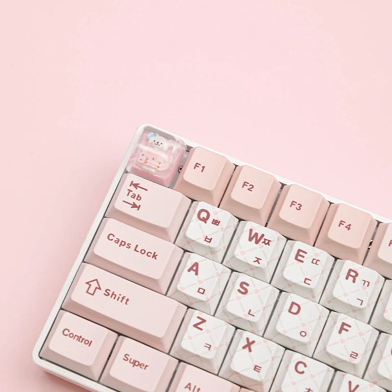Handcrafted resin Maltese dog ESC keycap, detail shot. Features a whimsical line-art Maltese in a playful outfit, encased in clear resin.