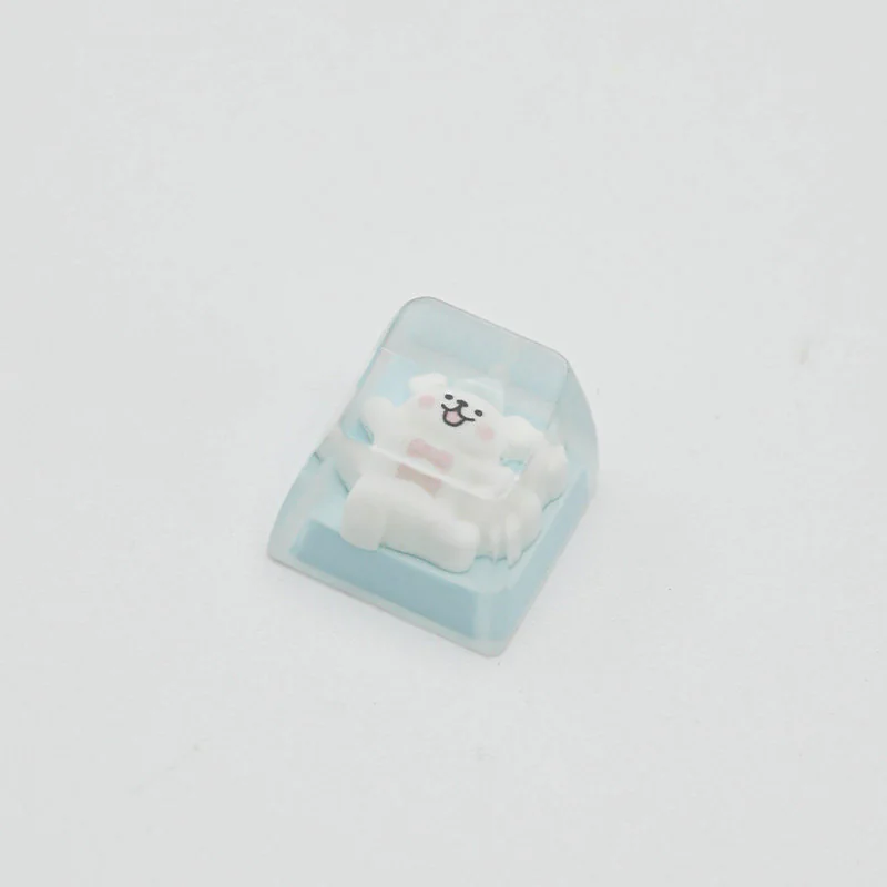 Playful handcrafted Maltese dog ESC keycap: a clear resin dome encasing a line-art puppy wearing a whimsical blue pointed hat.