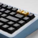 Premium zinc alloy Super Mario Question Block backspace keycap. Detailed views show its iconic pixelated design and vibrant, durable finish.