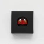 Premium zinc alloy Super Mario Question Block keycap, captured from a dynamic angle, revealing its vibrant pixelated detail. A playful and premium Mario setup.