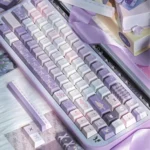 Whimsical marionette puppet PBT keycaps set, showcasing intricate dye-sublimated designs and premium PBT quality for a unique, artistic keyboard aesthetics.