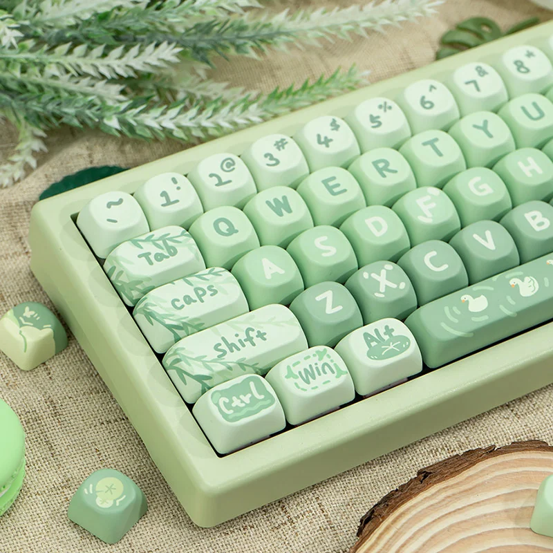 Detailed shot of the Matcha Green PBT MOA Keycaps Set, displaying gentle hues, evoking serene spring picnic vibes.