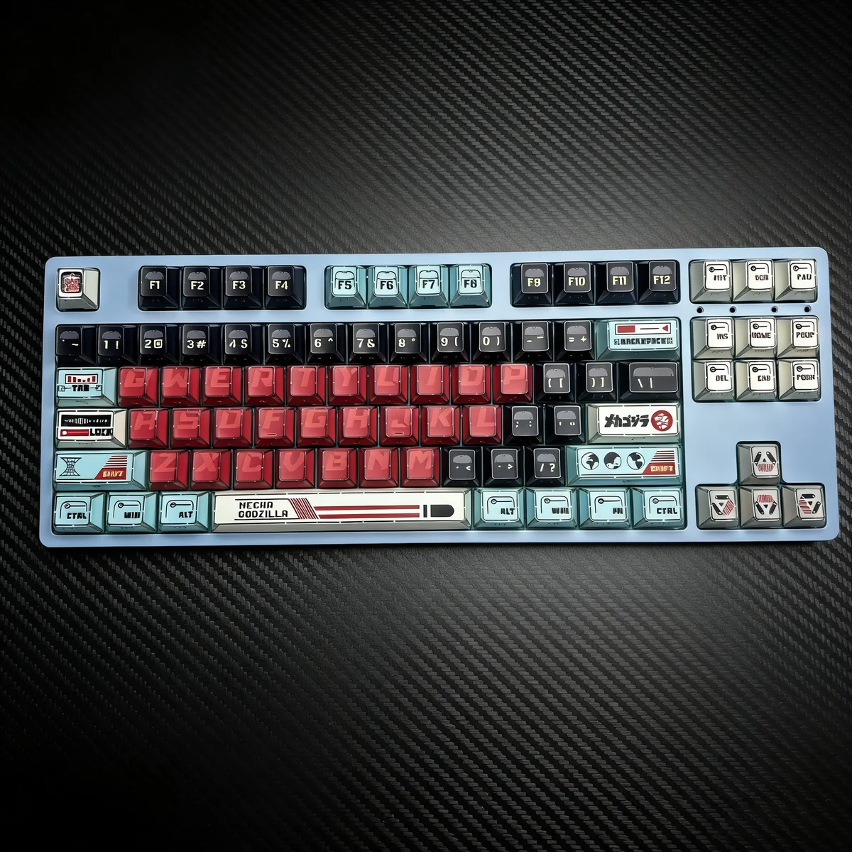 Fierce, angular, translucent Godzilla PBT keycaps set, showcasing shine-through side-printed legends and artistic modern design, ideal for backlit keyboard.