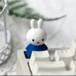 Detailed view of the charming Miffy & Friends handcrafted resin ESC keycap, highlighting the adorable characters and vibrant, whimsical design.