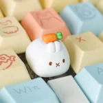 Handcrafted Miffy Carrot resin keycap for Esc key. Playful Miffy design, sculpted and shown from various angles, creating a whimsical desk aesthetic.