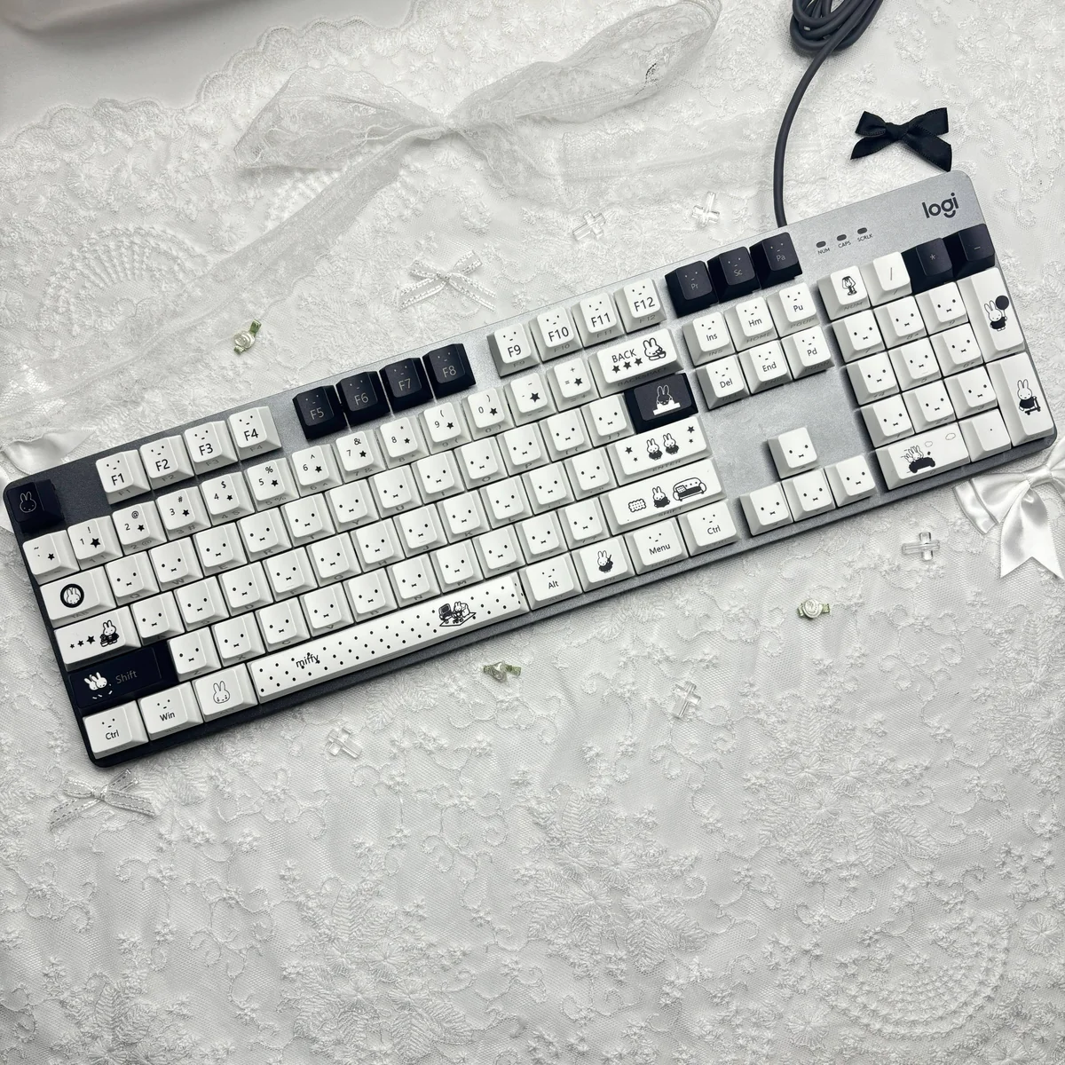Playful Miffy PBT keycaps set, featuring iconic characters in a minimalist design, perfect for joyful backlit typing.