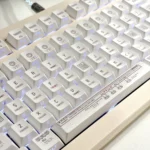 Charming Miffy Pixel Art Keycap Set displayed from various angles. Gentle pixel art Miffy characters in a soft, whimsical retro aesthetic bring playful design.