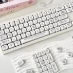 Close-up of a gentle Miffy pixel art keycap set, showcasing its charming retro aesthetic and soft whimsical colors. These Miffy Keycaps offer playful desk accessories.