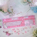 A close-up view of the exclusive Mika Misono Blue Archive keycaps set, showcasing vibrant character legends and premium detailed artistry from multiple angle.