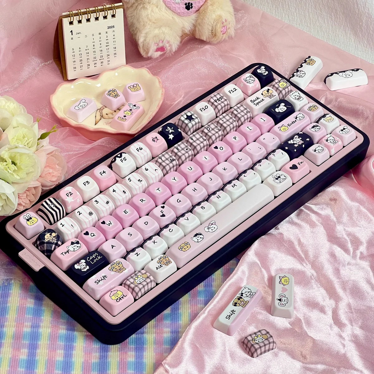 Mikko PBT keycaps set in a playful black, white and pink design, showcasing their durable 5-sided dye-sub legends and Cherry & FOA profile from various angles.