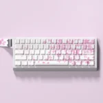 Vibrant Miku Nakano PBT shine-through keycaps set, featuring durable Cherry profile and playful anime character design. Perfect for custom keyboards.
