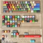 Close-up of authentic Minecraft pixel art keycaps set, showcasing various iconic characters and blocks in vibrant detail on Cherry profile gaming keyboard.