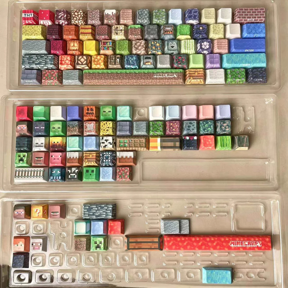 Close-up of authentic Minecraft pixel art keycaps set, showcasing various iconic characters and blocks in vibrant detail on Cherry profile gaming keyboard.