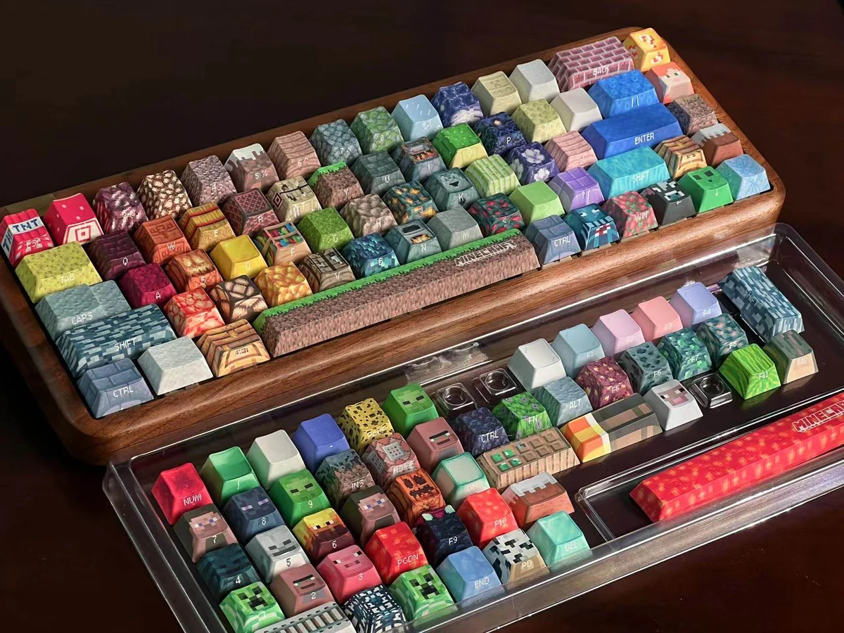 A collection of authentic Minecraft pixel art keycaps set for gaming keyboards, featuring iconic blocks and characters from various angles, perfect for fans.