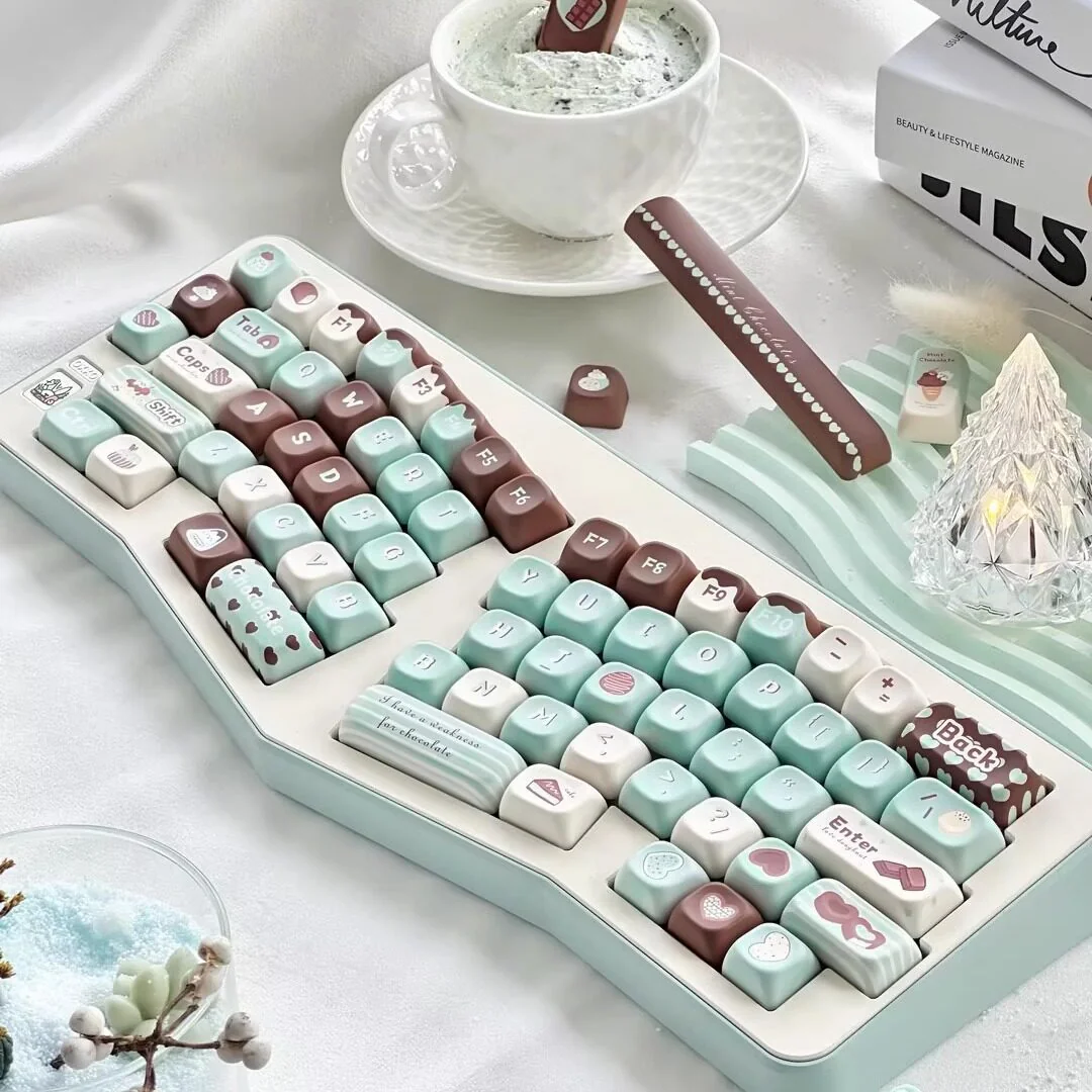 Delightful premium PBT dye-sub mint chocolate keycaps set, shown from various angles. Inviting mint green and warm chocolate brown create a sweet, comfortable design.
