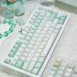 Serene 147-key misty mint PBT+PC translucent keycaps set, capturing an ethereal salty essence and refreshing coastal mist.