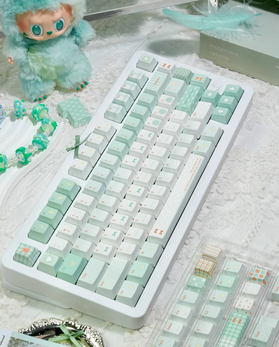 Serene 147-key misty mint PBT+PC translucent keycaps set, capturing an ethereal salty essence and refreshing coastal mist.