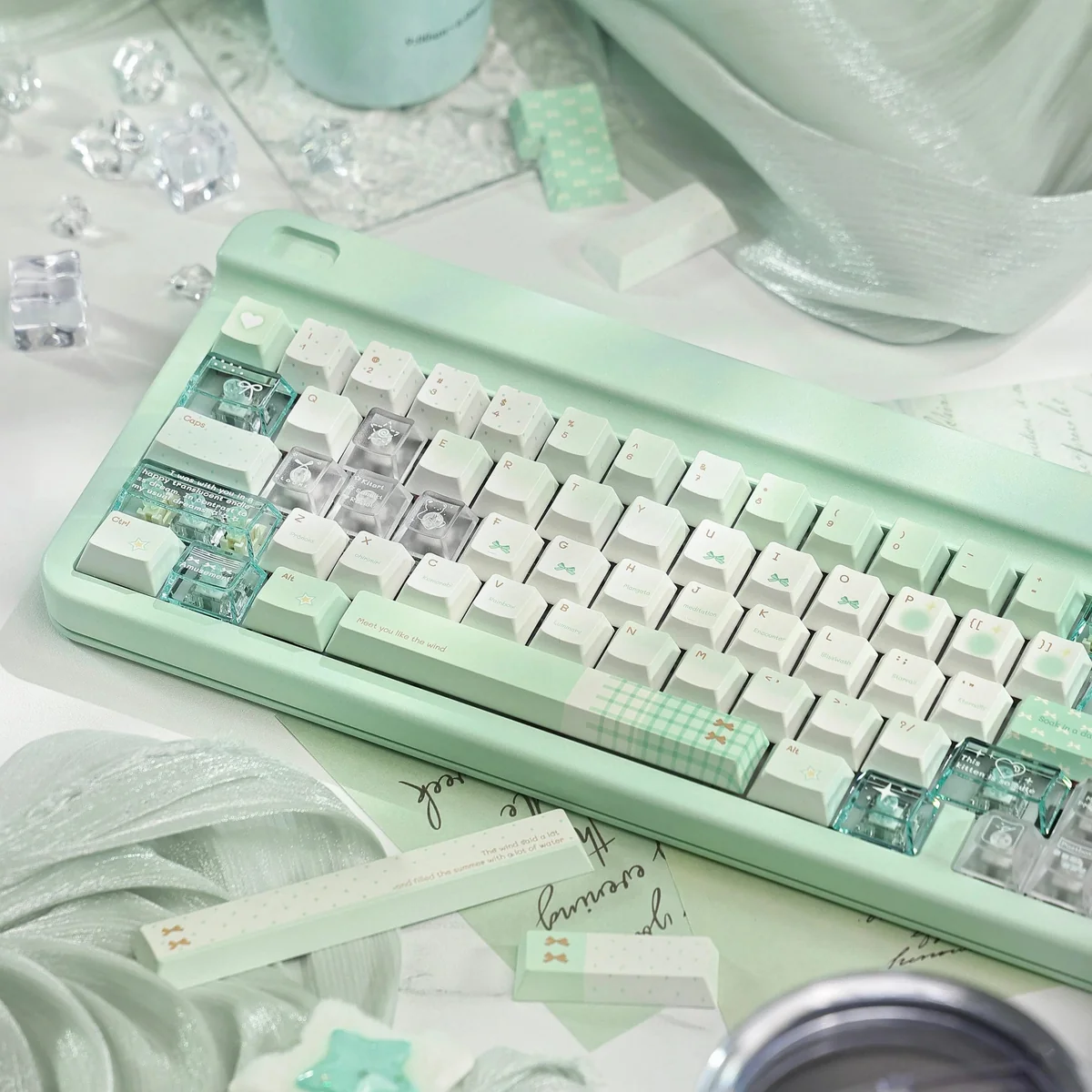 Misty Mint Keycaps set, showcasing their serene PBT+PC translucent design with a refreshing, ethereal coastal freshness.