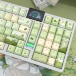 Detailed view of the Serene Mountain Stream Side-Lit PBT Keycap Set, highlighting its tranquil design and luminous, side-engraved legends on durable material.
