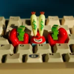 Vibrant Mr. Krabs resin keycap featuring playful money-sign eyes and a detailed money-stack claw, perfect for SpongeBob fans and custom keyboards.