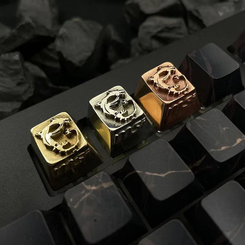 Close-up of an MSI Logo artisan keycap, highlighting its handcrafted metallic luster and industrial retro design with a prominent brand logo.