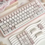 An angled shot of the My Melody Sweet Date 134-keycap set, highlighting various pastel keycaps with whimsical My Melody designs, perfect for a sweet date design.