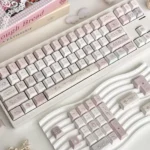 Whimsical My Melody Sweet Date 134-Keycap Set in pastel hues, shown from various angles, perfect for charming kawaii keyboard customization.
