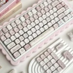 A charming My Melody Sweet Date 134-keycap set, with whimsical pastel My Melody illustrations, viewed from a delightful angle for kawaii keyboard.