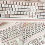 Delightful My Melody keycaps set in a Sweet Date theme, showcasing whimsical pastel hues artwork for charming kawaii keyboard customization.