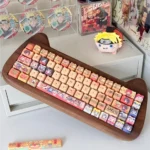 Artistic Naruto PBT dye-sub keycaps set displayed from various angles, featuring vibrant anime characters and ninja symbols to unleash your inner ninja.