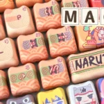 Immersive Naruto MAO height 143-key PBT dye-sub keycaps set, featuring vibrant artistic anime designs of iconic ninja characters and motifs.